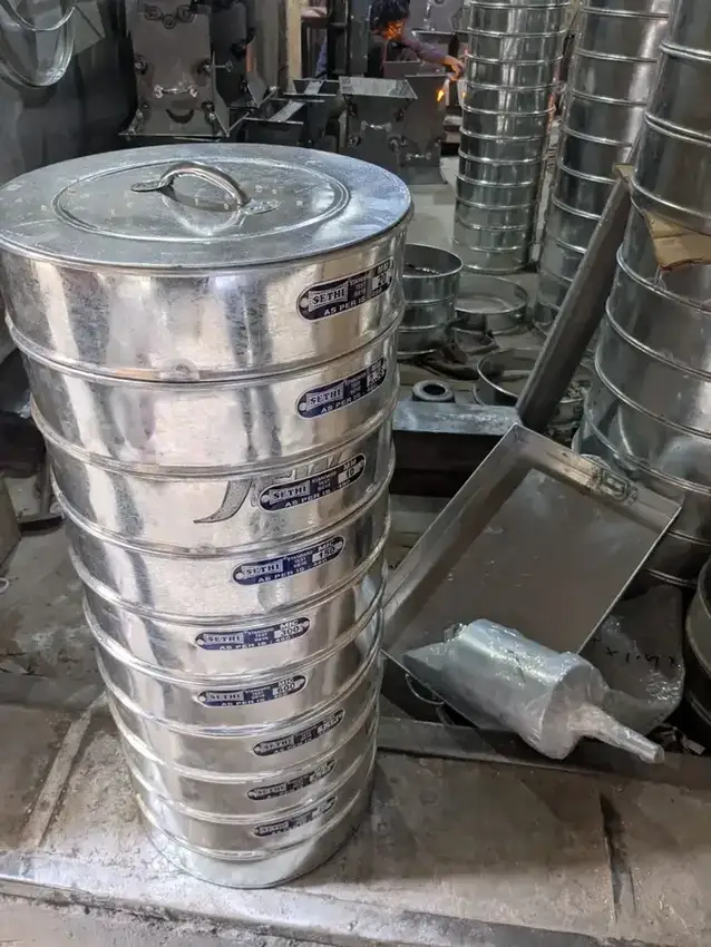 Stainless steel test sieves in the Labtek Enterprises workshop in New Delhi